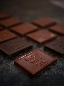 Products: Enjoy Your Stay' Chocolate Squares - Coromandel Chocolate