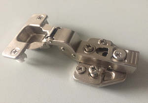 Kitchen Storage Accessories: Concealed Hinges with Integrated Soft-Close