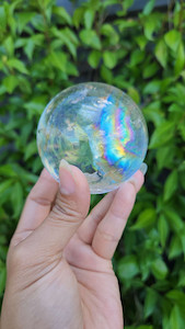 Clear quartz sphere with rainbow CrystaLandnz