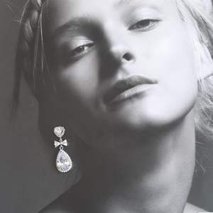 Champagne Ice: Yvette - Cubic Zirconia crystal clear heart, bow and pear shaped drop silver-tone stud earrings