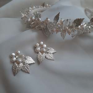 Chiara - crystal clear and white cultured freshwater pearls and silver leaves he&hellip;