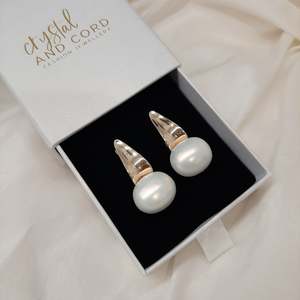 Stylish Classics: Nadine - oval shell bead pearl and gold tone droplet stud earrings