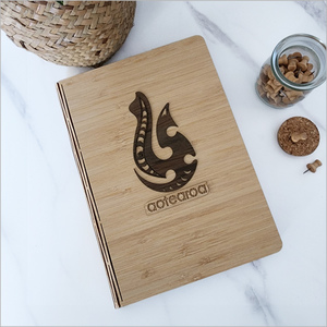 Products: Bamboo Journal: Hei Matau River Rimu Veneer (rrmtnb)Bamboo Journal with replaceable book