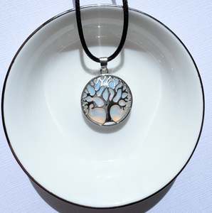 Pendants: Tree of life round crystal pendants.