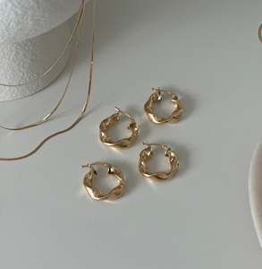 Earrings: Bold Wavy Hoop Earrings