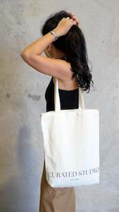Merchandise: Curated Tote Bag