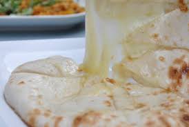 Products: Cheese Naan - Curry Guru Tweed Street
