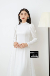 Graceful White Silk Bridal Ao Dai with Puffed Sleeves and Pearl Trim