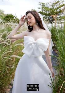 Sweep Train Wedding Dresses: Elegant Strapless Bow-Accented Wedding Dress