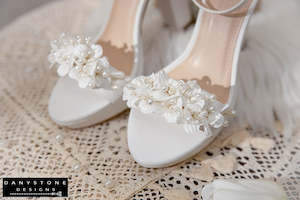Designer Shoes: Elegant White Matte Leather Wedding Sandals with Pearl Flowers