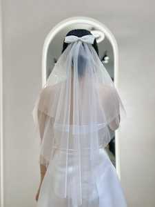 Elegant Tiered Veil with Classic Bow Accent