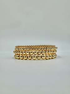 Timeless Luxury: Gold Bead Bracelets