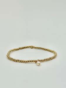 Classic Elegance: Petite Pearl Pendant Bracelet