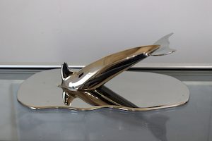 Products: Dolphin in Puddle – Darren Wise Stainless Sculptor www.darrenwise.co.nz