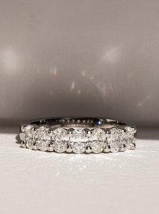 Ceremonial Collection: Platinum Oval Diamond Shared Claw Band