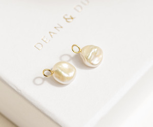 All Earrings: Milieu Keshi Pearl Charms