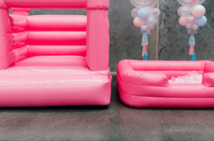 Hot pink bounce house ballpit package