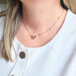 Initial Necklaces: Gold Bow Necklace