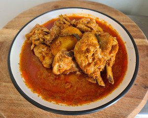 Products: Chicken Xacutti Dona Lou's