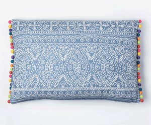 Products: Isfahan – blue embroidered cushion with pom poms
