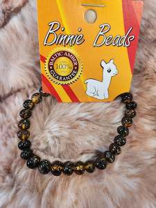 Pharmacy Or Health: Adults Amber bracelet - Black and Green