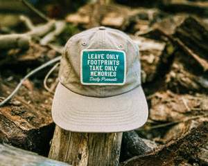 Apparel Clothing: Footprints & Memories Patch Cap | faded unstructured vintage style khaki baseball hat.