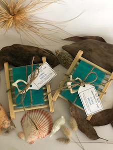 Products: Ocean Breeze on a wooden soap dish Eco Savvy