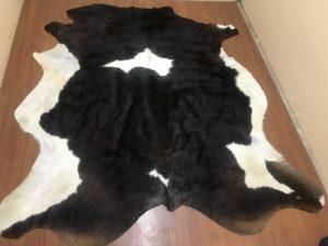 Hide: Dark Brown/White cow hide