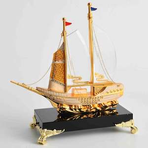 Golden Sailboat Triumph Decor