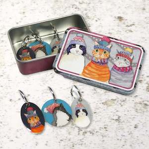 Frontpage: Cats in Hats stitch markers in a pocket tin