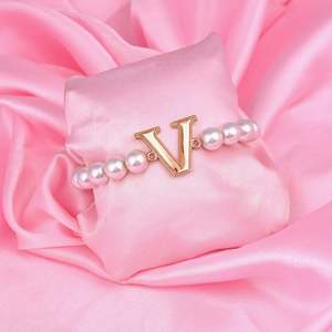 Bracelet: Estele Rose Gold Plated Versatile "V" Letter Glass Pearl Bracelet for Women