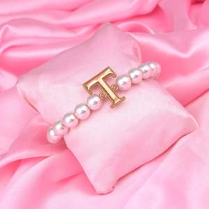 Bracelet: Estele Rose Gold Plated Twinkling "T" Letter Glass Pearl Bracelet for Women