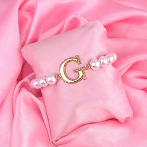 Estele Rose Gold Plated Glowing "G" Letter Glass Pearl Bracelet for Women