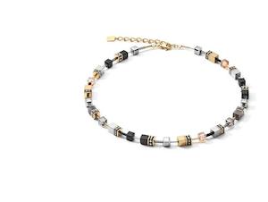 Fashion Jewellery Coeur De Lion: COEUR DE LION NECKLACE, GOLD PLATED ST/ST GEO-CUBE IN BLACK/GOLD & TITANIUM OXIDE HEMATITE/ SYNTHETIC TIGER EYE/ RHINESTONE/ GLASS & EUROPEAN CRYSTALS