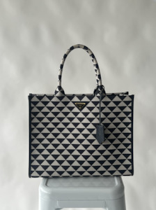 Prada: Large Prada Symbole embroidered fabric handbag
