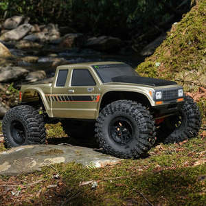 Radio Controlled Cars: 1/10 SCX10 III Coyote 4X4 RTR Rock Crawler (Battery & Charger Included), Gold | Axial Adventure