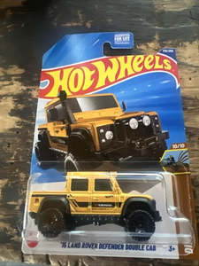 Die Cast Models: Hot Wheels 15 Land Rover Defender Double Cab Yellow