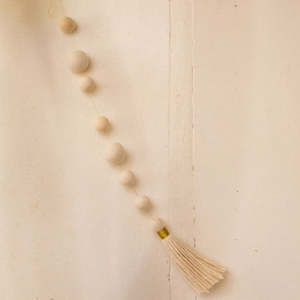 Home Decor: Muskhane Pearls and Pompom Hangings | Three Colours