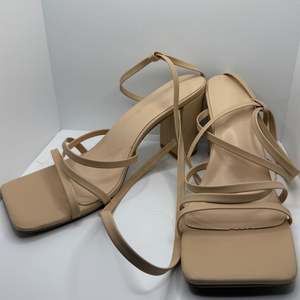 Thrift: Cream Strap Heels