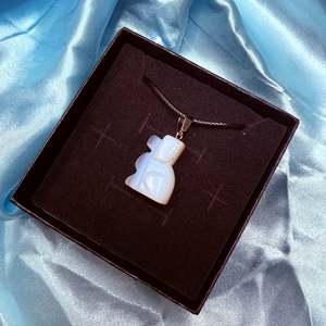 Necklaces: Opalite Carved Dog Necklace