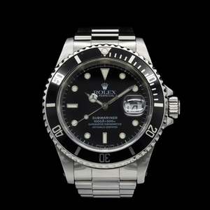 Rolex - 1997 Submariner Date 16610