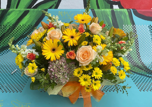 EA12 BRIGHT FLOWERS IN BASKET - Flavells Floral Boutique