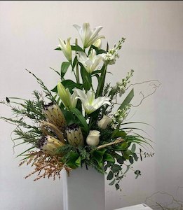 arrangement: Exquisite seasonal arrangement.