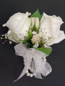 Packaging: White wrist Corsage
