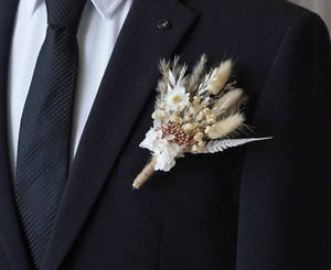 Products: Bunny tail and fern Bohemian Boutonniere Flower Boutique