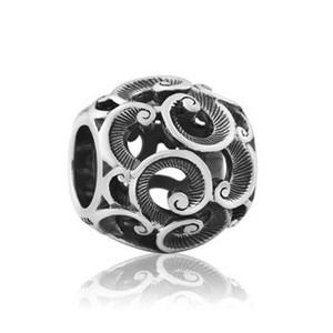 Products: Evolve Treasured Koru (Valued) Charm