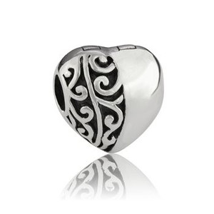 Products: Evolve Koru Heart Clip