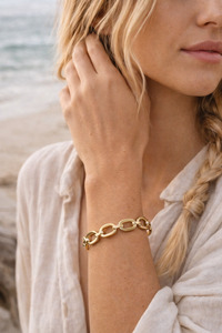 Flying saucers gold link bracelet