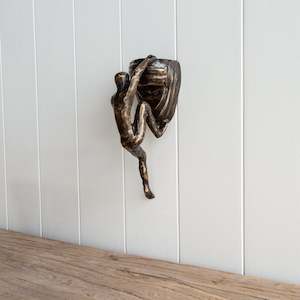 Bronze Sculptures Ornaments: Bronze Wall Ornament | Rock and a Hard Place