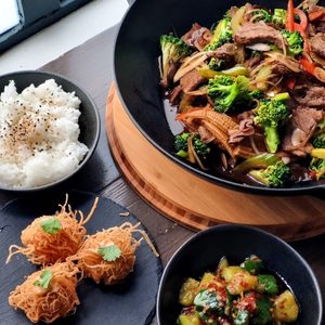 Products: A. The Takumi Wok Set by Ironclad Co. Handcrafted 31cm Cast Iron Wok - Elemental Cooking School by Sachie